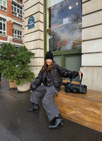 [DEINET] BELTED POCKET SHOULDER BAG IN BLACK