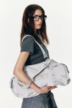 DEINET LOGO DUFFLE BAG IN GREY