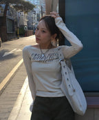 LETERIE LETTERING OFF-SHOULDER TIE LONG SLEEVE_IVORY