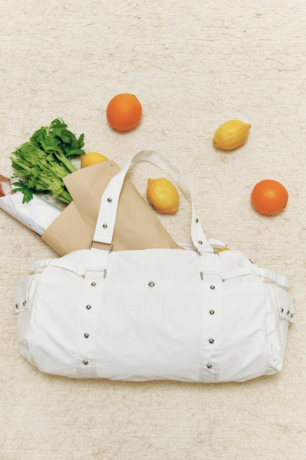 DEINET LOGO DUFFLE BAG IN WHITE