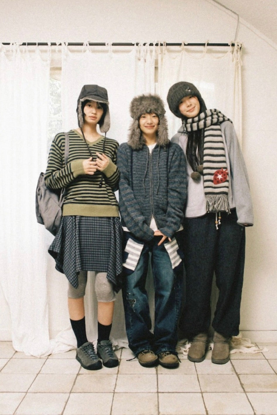 aeae STRIPE TASSEL MUFFLER [BROWN]