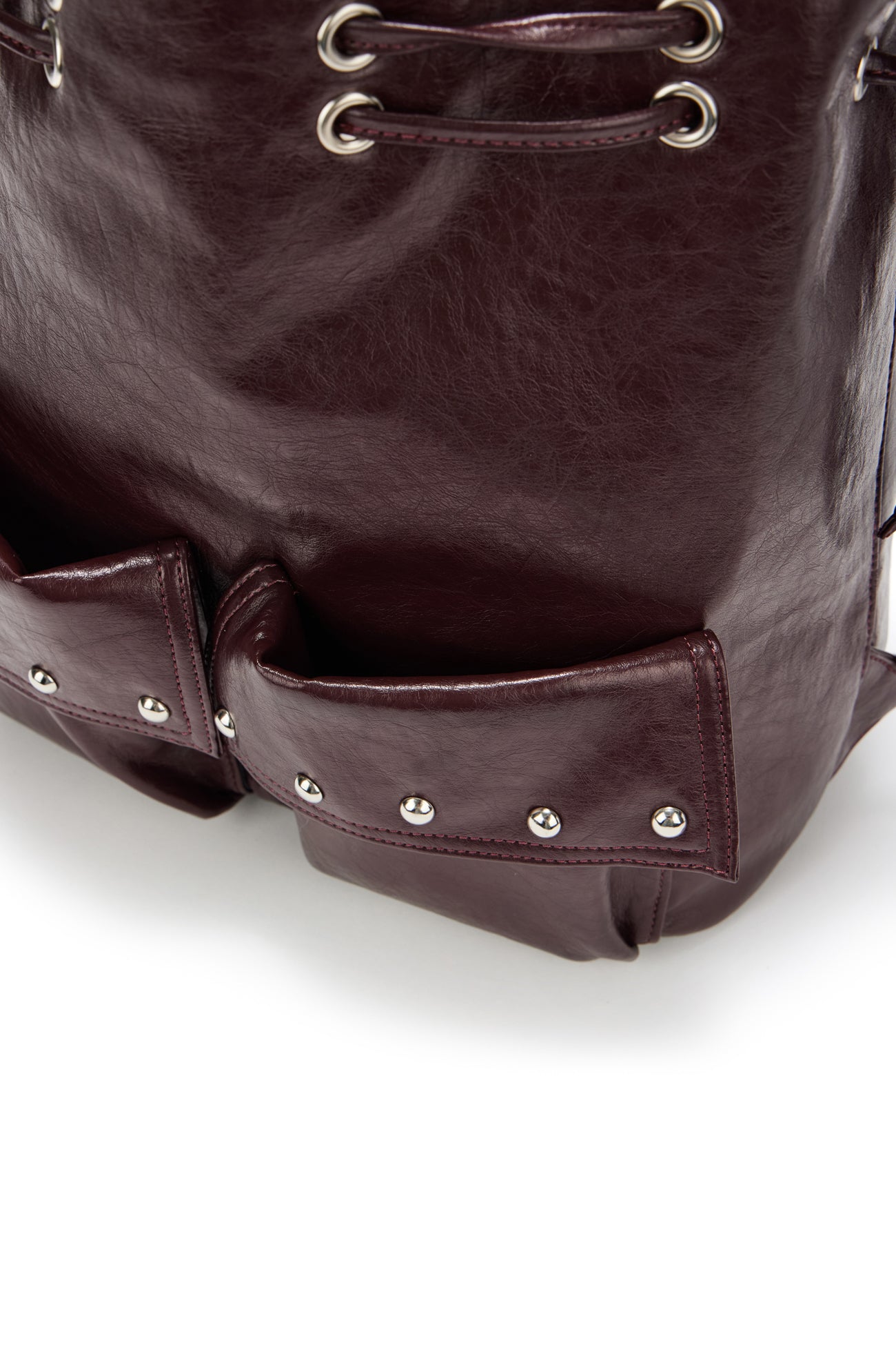 DEINET 5-WAY STUD POCKET MULTI BAG IN BURGUNDY