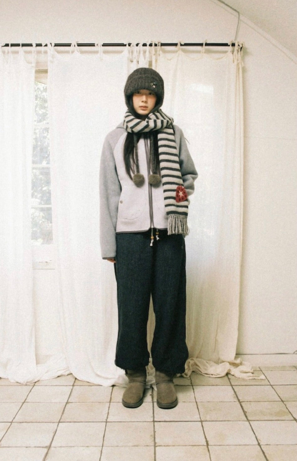 aeae STRIPE TASSEL MUFFLER [BROWN]