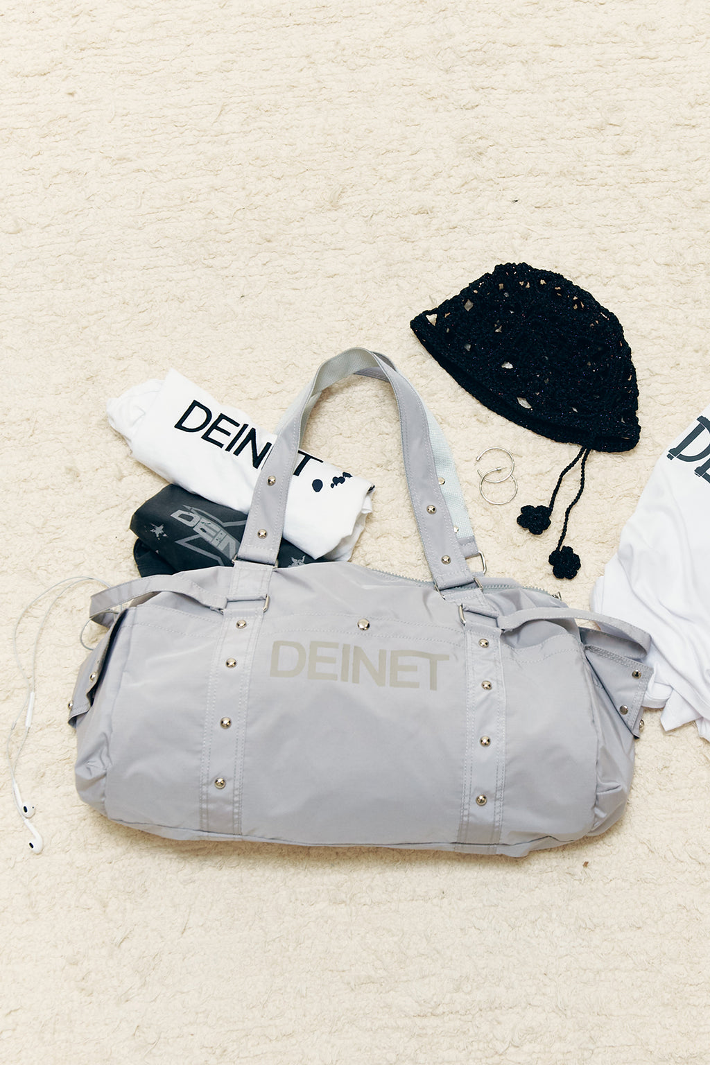 DEINET LOGO DUFFLE BAG IN GREY