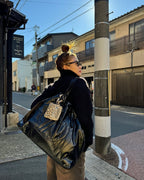 DEINET D STITCH PADDING BAG IN BLACK