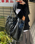 DEINET D STITCH PADDING BAG IN BLACK