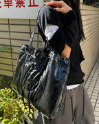 DEINET D STITCH PADDING BAG IN BLACK