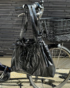 DEINET D STITCH PADDING BAG IN BLACK