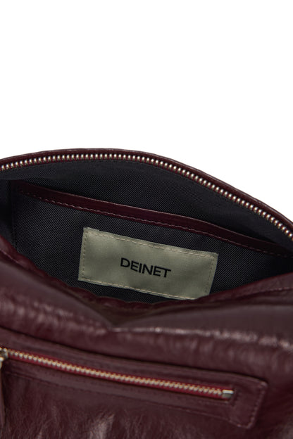 DEINET STUD POCKET BAG IN BURGUNDY