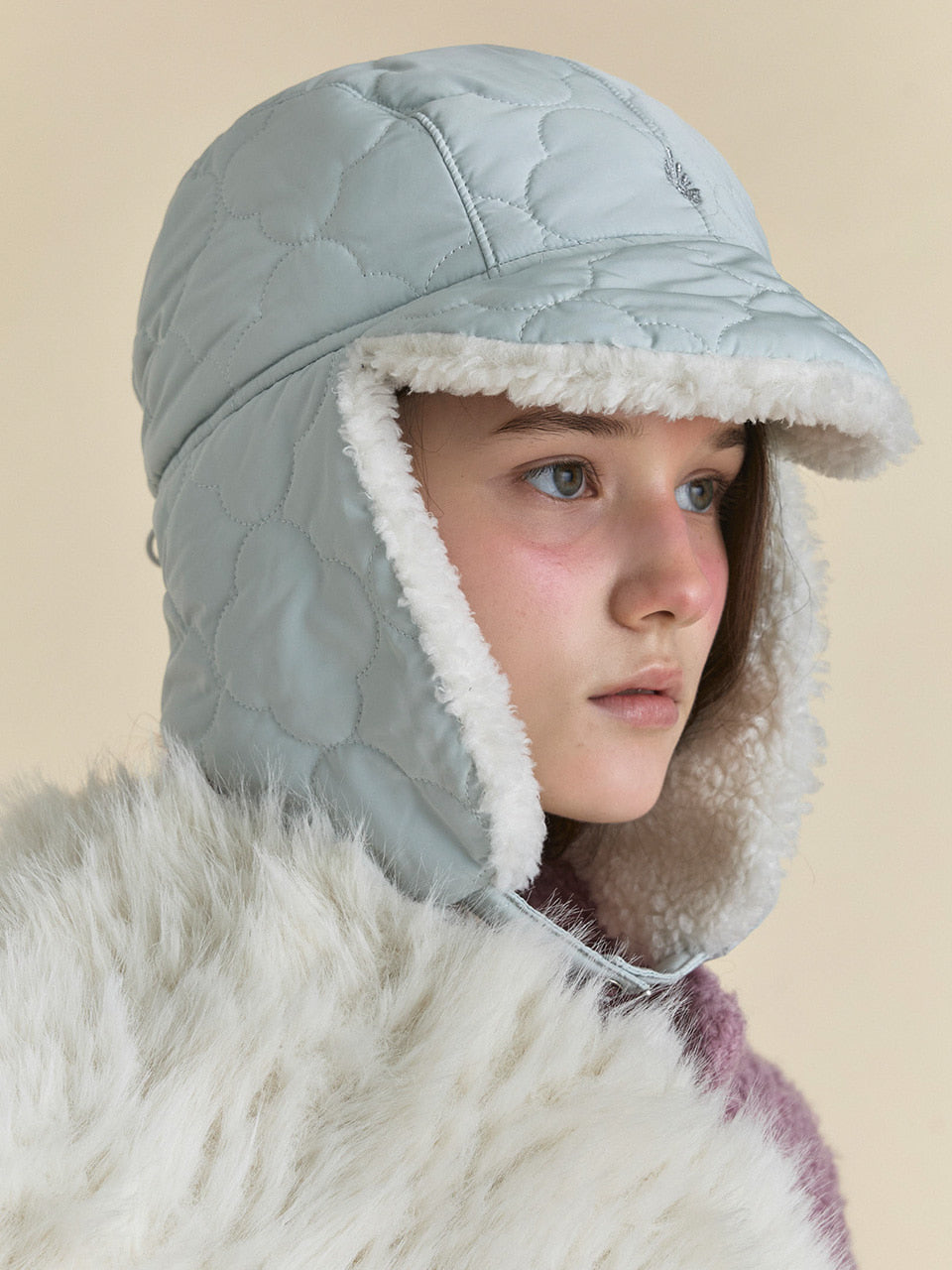 POESIEDAME PADDING EARFLAP HAT IN CLOVER ICEBERG