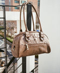 IUGA STUDDED LEATHER BOWLING BAG / BROWN