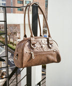 IUGA STUDDED LEATHER BOWLING BAG / BROWN