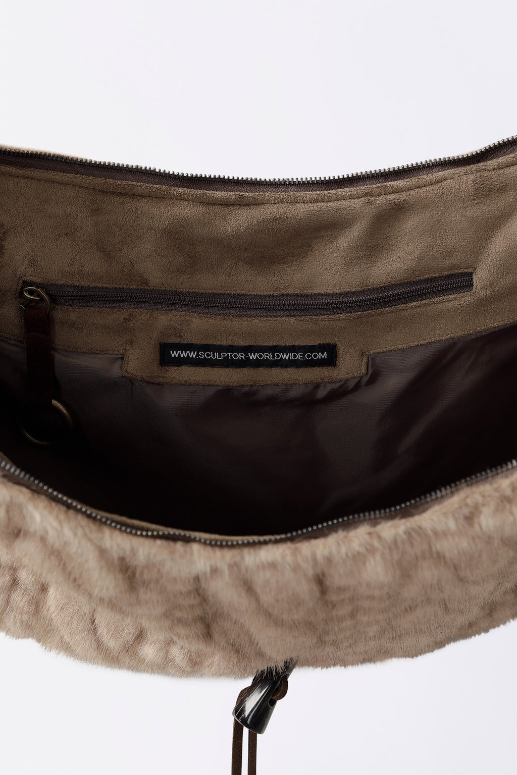 Sculptor Horseshoe Fur Bag Brown