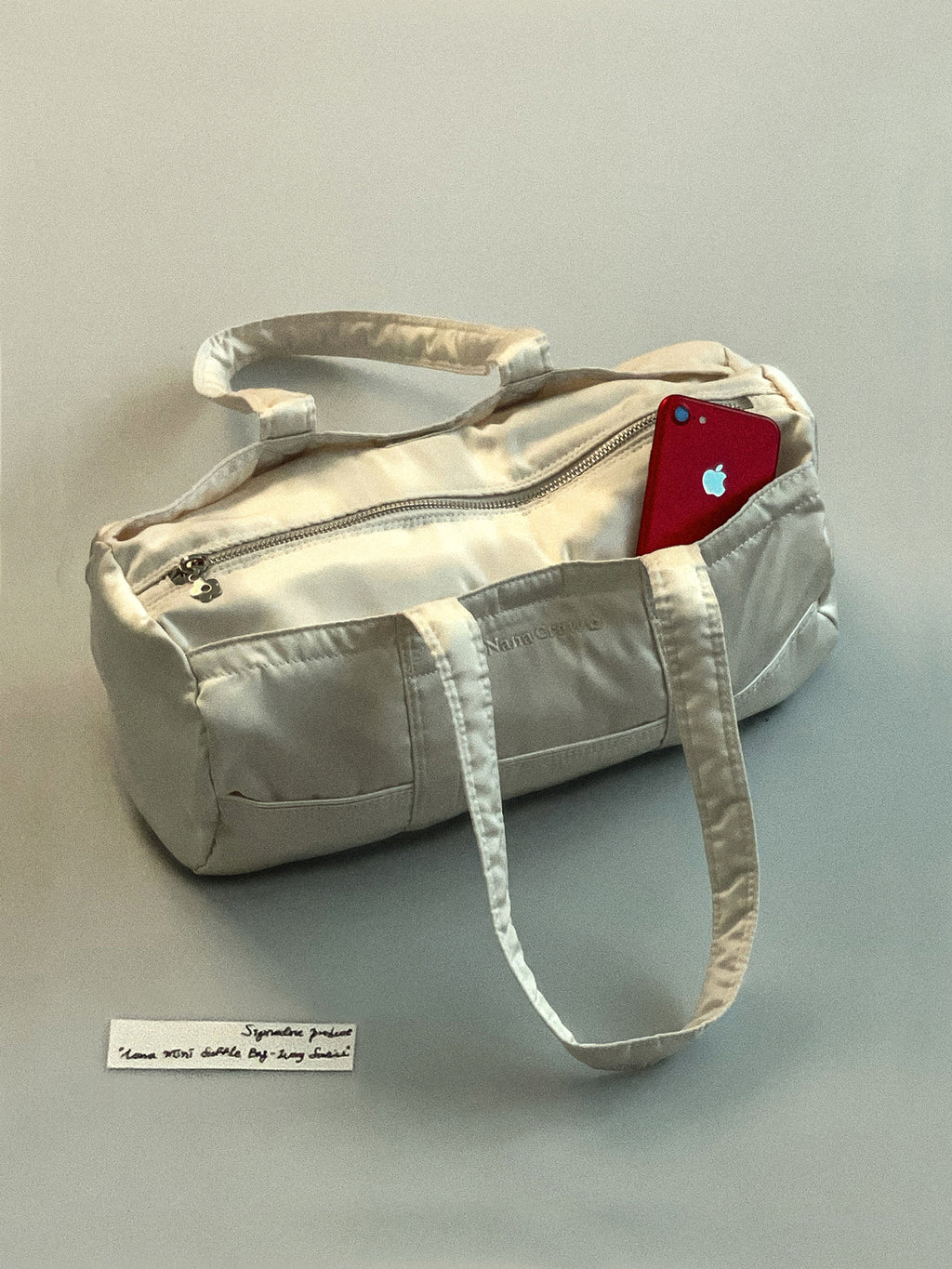 NANACREW MINI DUFFLE BAG - IVORY SATIN